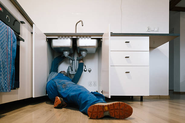 Professional Drain Cleaning technician working in Elmwood, MA